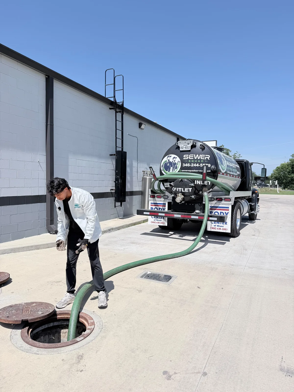 Sewer Squad service truck working in Spring, Texas